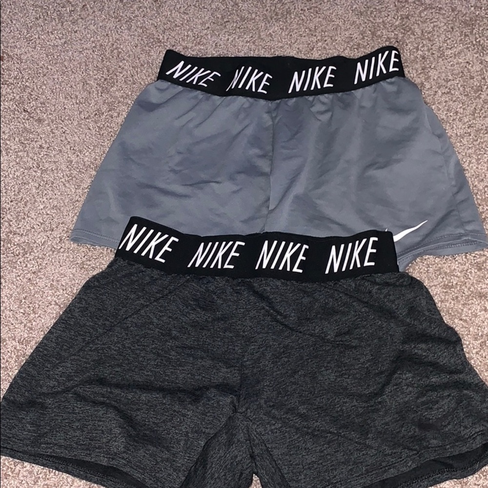 Grey and black Nike shorts